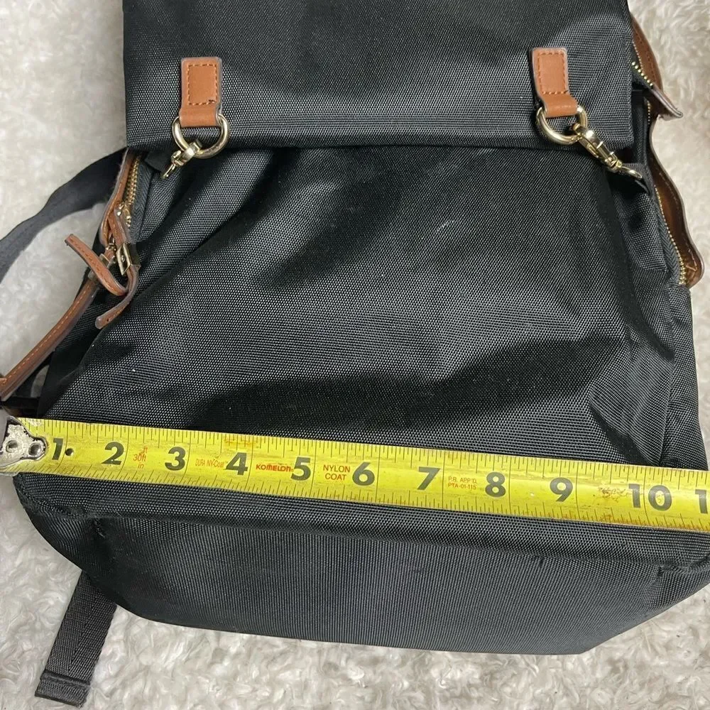 Tommy Bahama Black Laptop Case Backpack With Brown trims and straps .